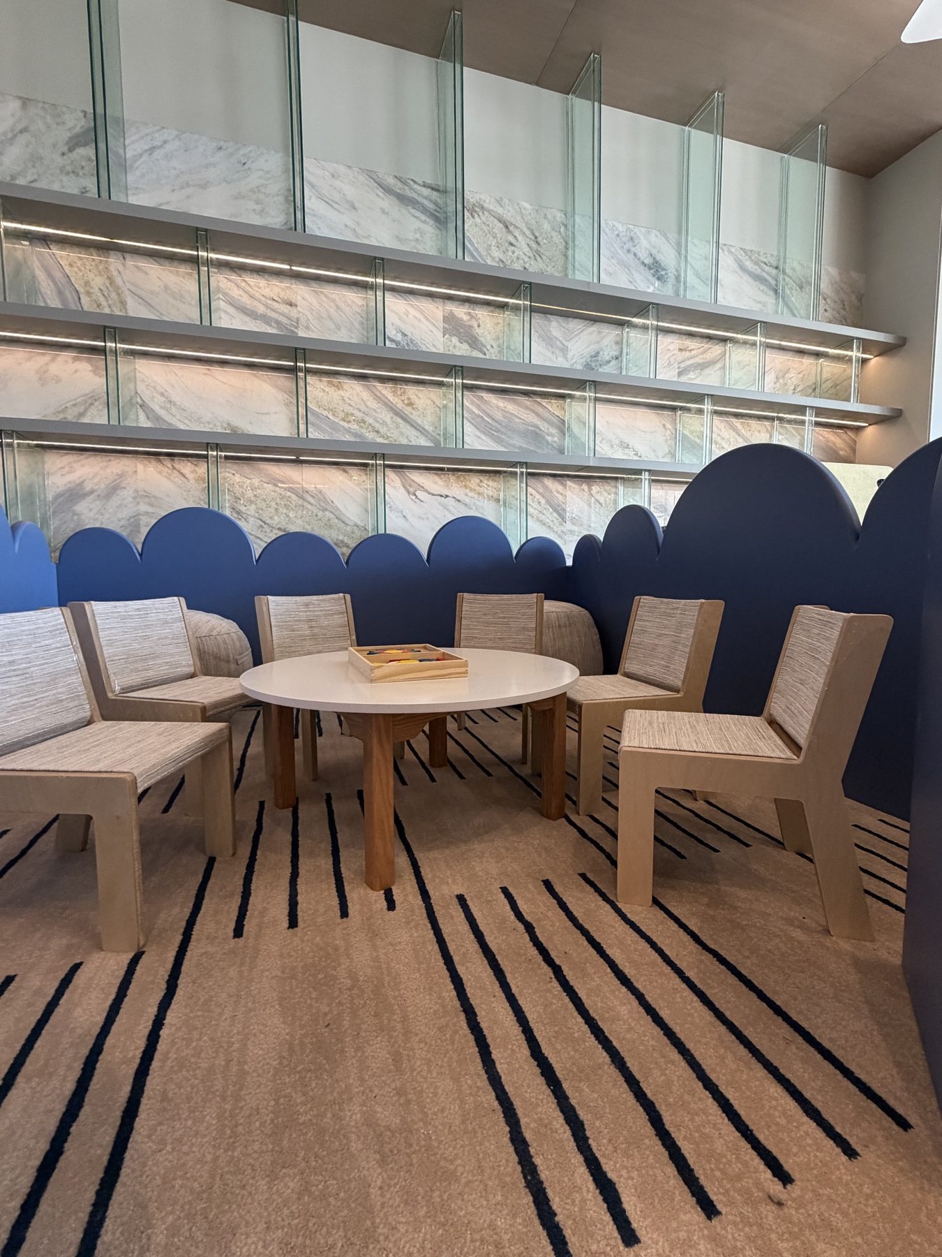 Family majlis with blue scalloped seating